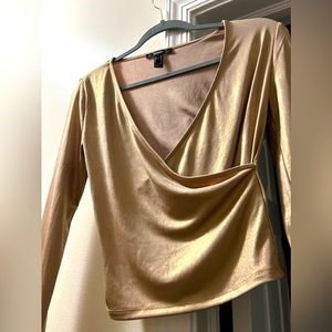 Gold long sleeve low cut wrap top